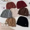100% pure wool knitted cap for women's autumn and winter new style, making the face look smaller, warm and ear-protecting solid color twisted cold cap Specification image
